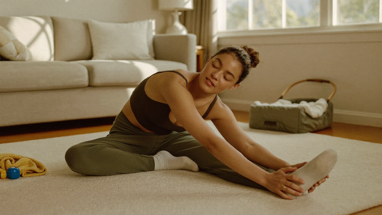 A mum doing gentle morning movement at home, feeling strong and calm
